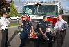 Liberty Lake City Council Member Josh Beckett (far right) talks shop with representatives from the Spokane Valley Fire Department at last month�s open house.